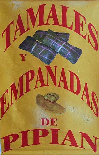 cartel anunciando tamales y empanadas de pipián 